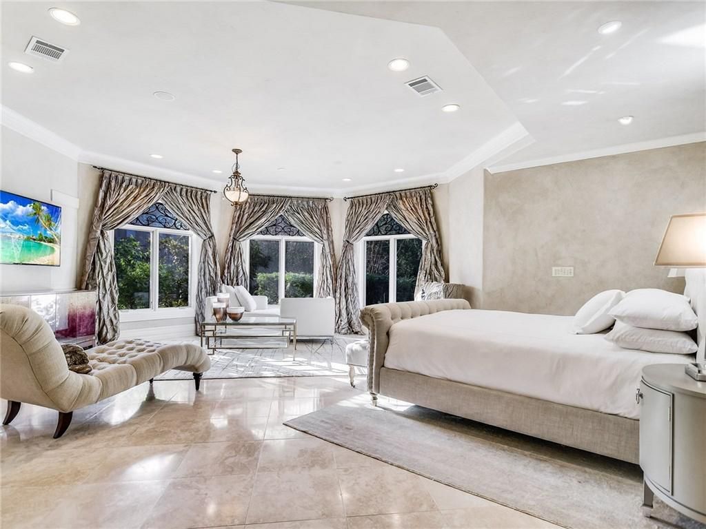Austin TX Master bedroom with curtains, tie backs and faux iron Curtains with tie backs and faux iron