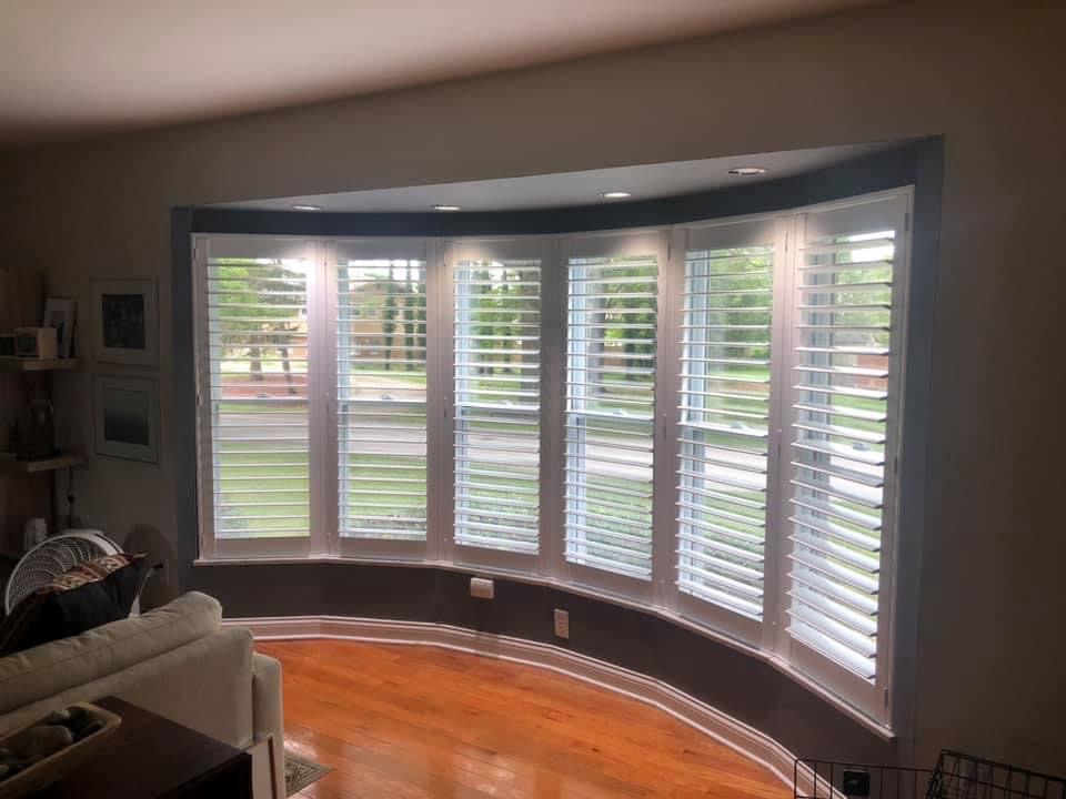 Bay and bow windows are beautiful architectural features that bring in natural light, expand your view, and add dimension to a room. However, their unique angles and multiple panes can make choosing the right window treatments a bit more complex.