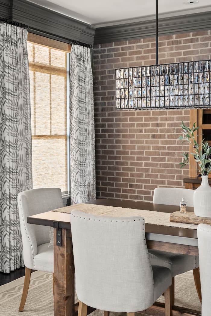 Inspired Drapes Drapery Inspired Drapes Natural Roller Shades Momeni Rug Dining Room (4)