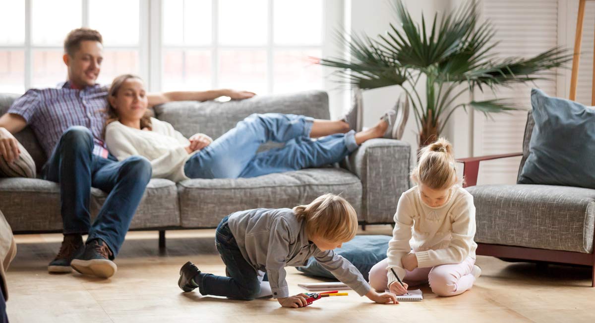 Family relaxing in living room Family relaxing in living room