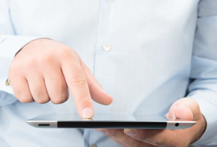 man with tablet