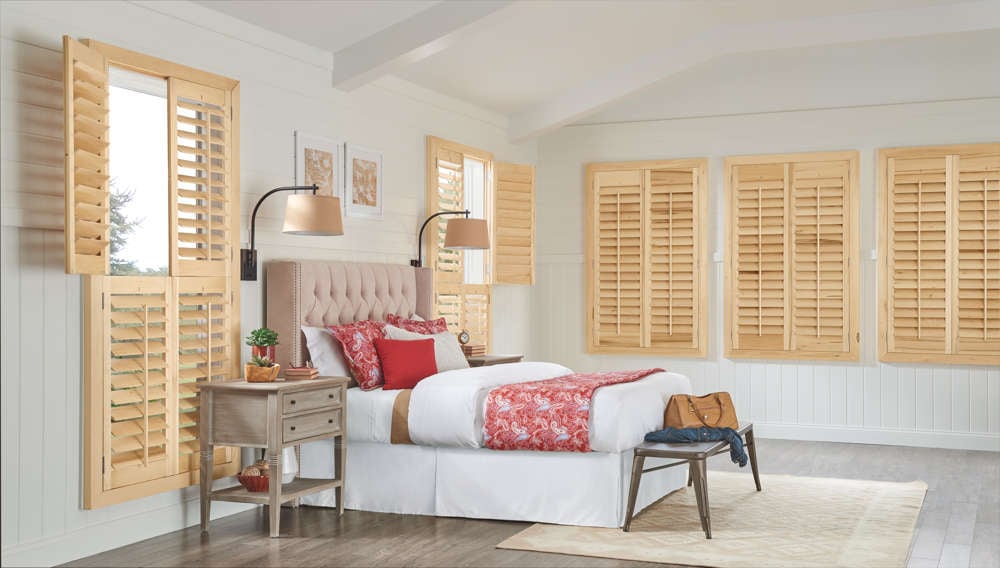 wood shutters in bedroom 