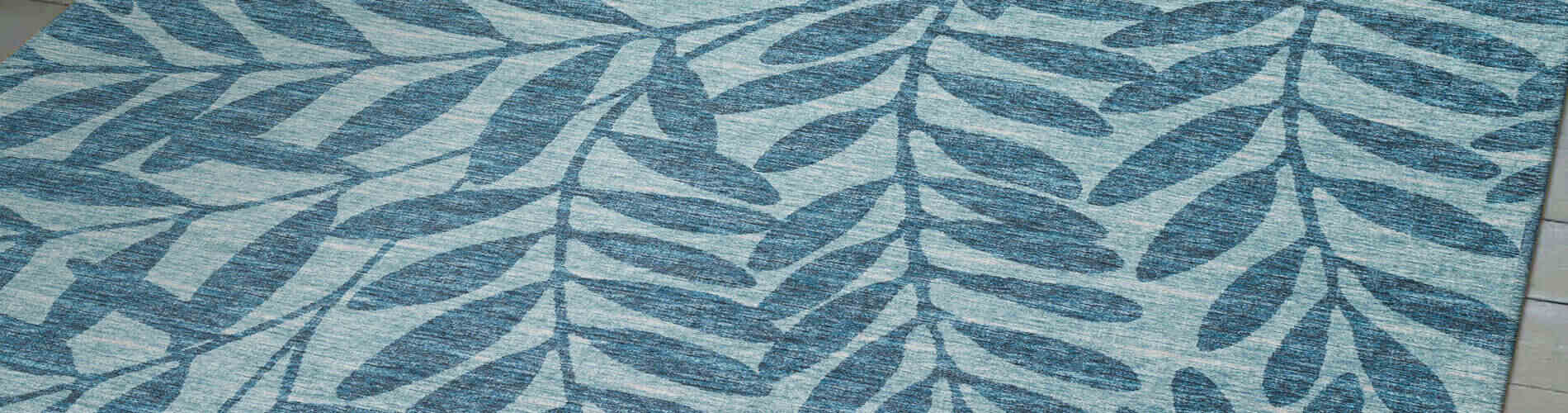 blue leaf patterned outdoor area rug