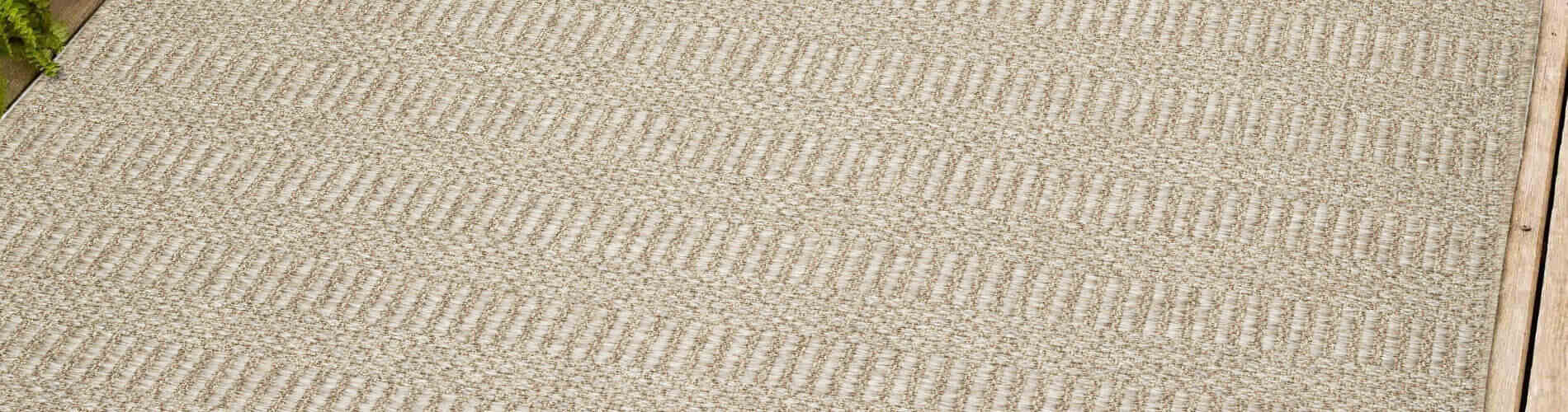 beige textured outdoor area rug
