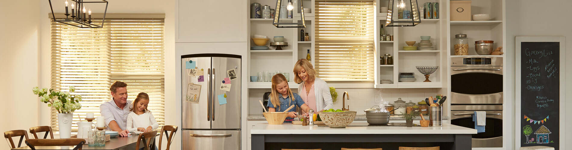 wood blinds in kitchen with family 