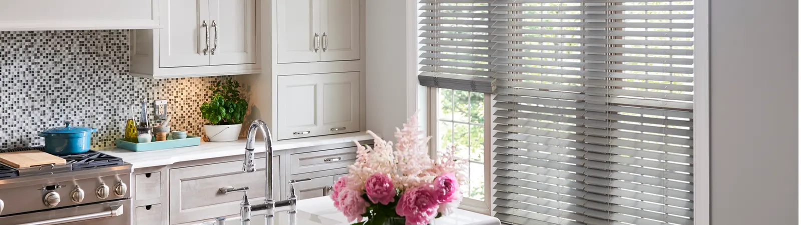 light gray wood blinds in a modern kitchen