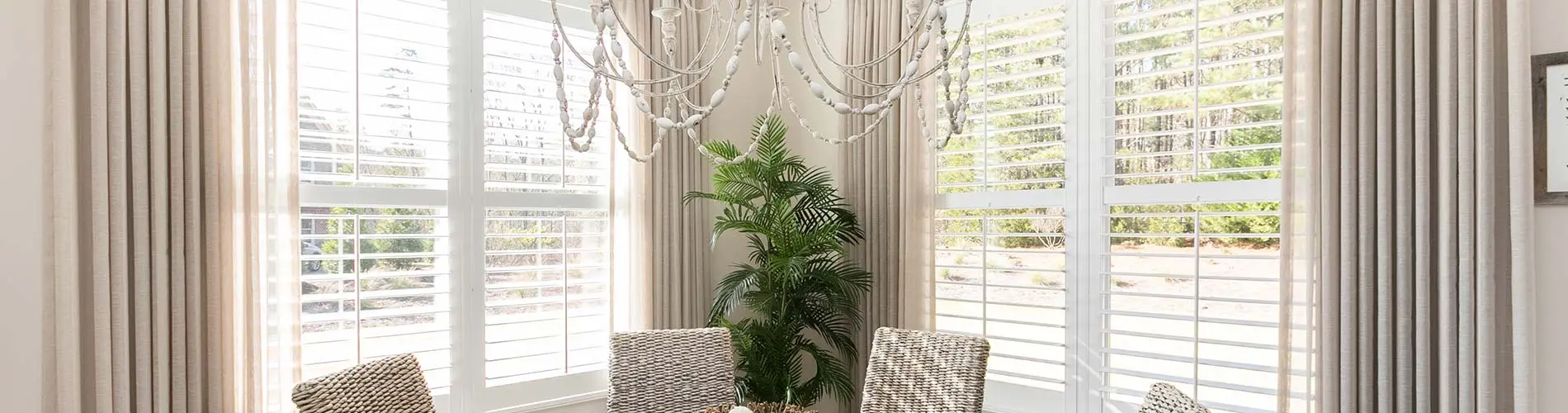 ivory drapes in dining room