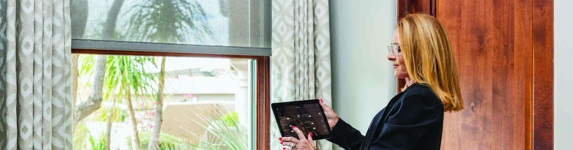 lutron automated shades with drapery in office