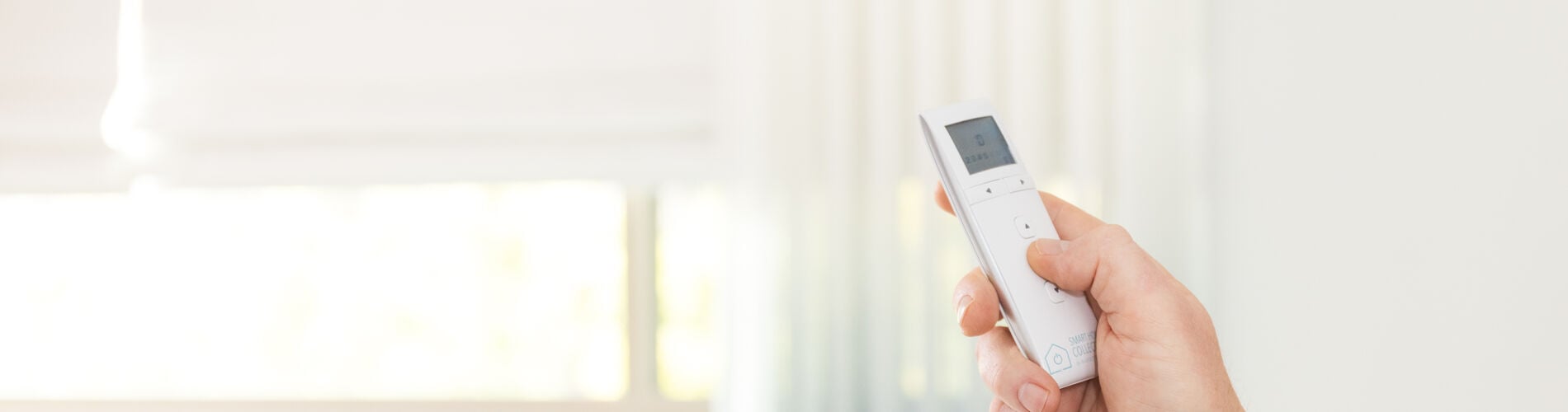 roman shade and smart home remote