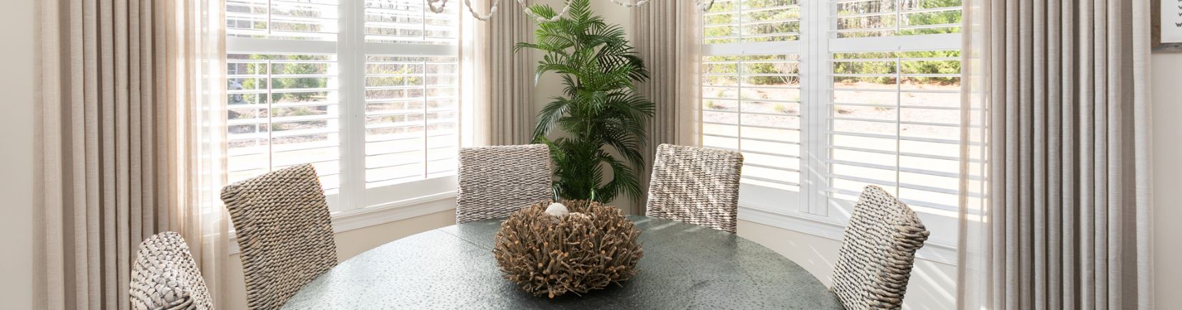 shutters and drapes in dining room