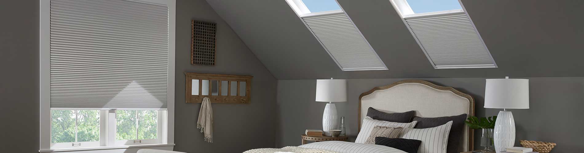 honeycomb-shades-skylight-bedroom-desktop