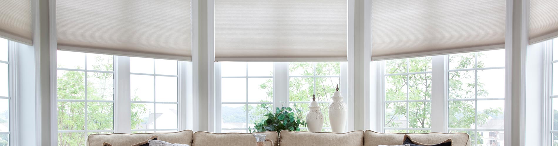 automated-cellular-shades-in-living-room-desktop
